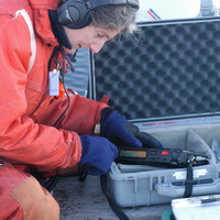 Recording humpback whale songs.